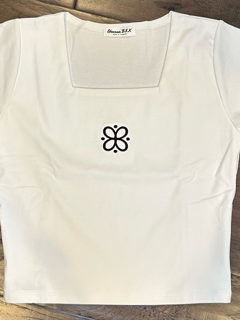 White Square Neck Tee with Center Emblem from Shanaa Bangkok (can fit up to L)